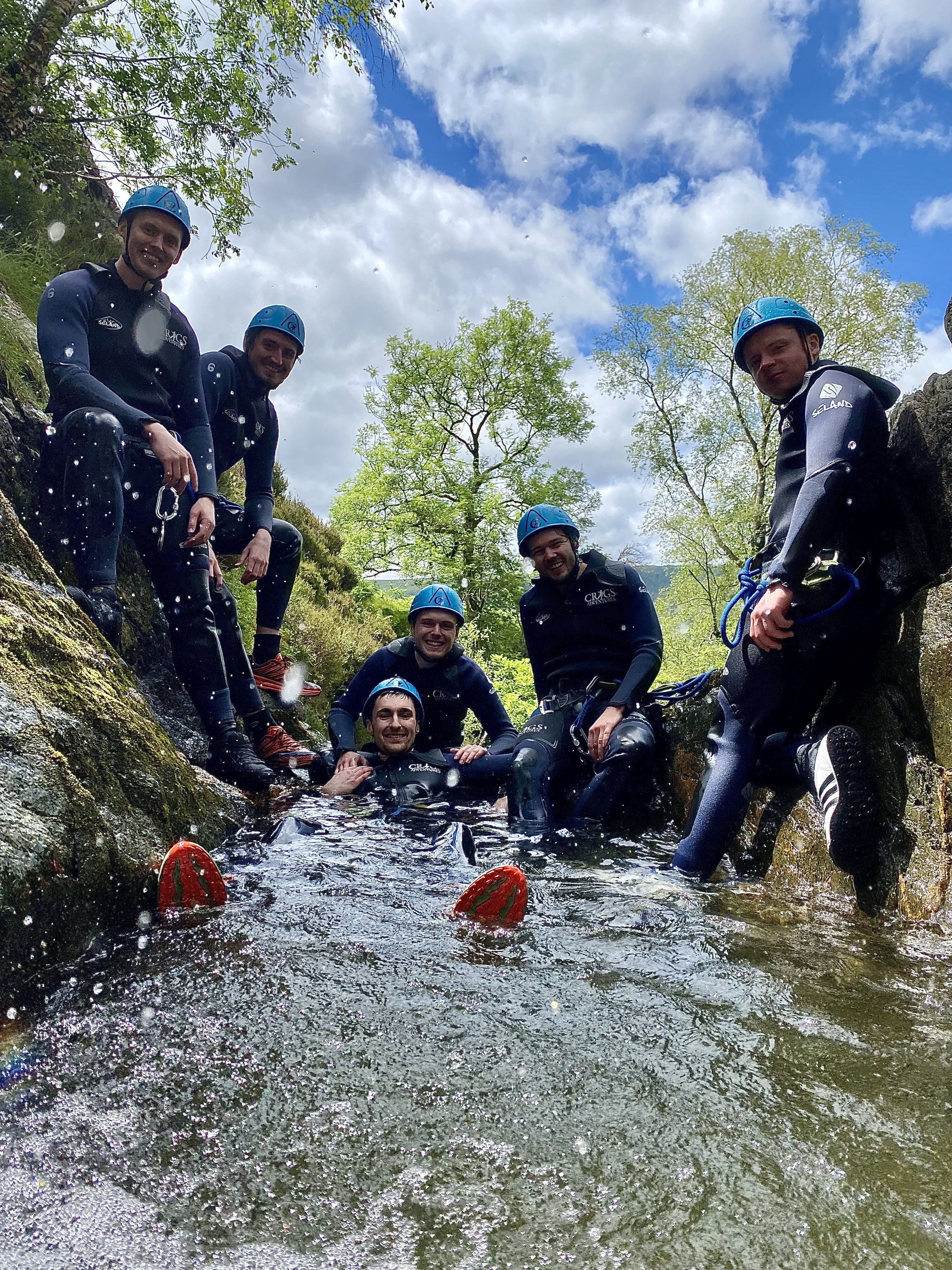 Group in Devils Canyon in a pool of water